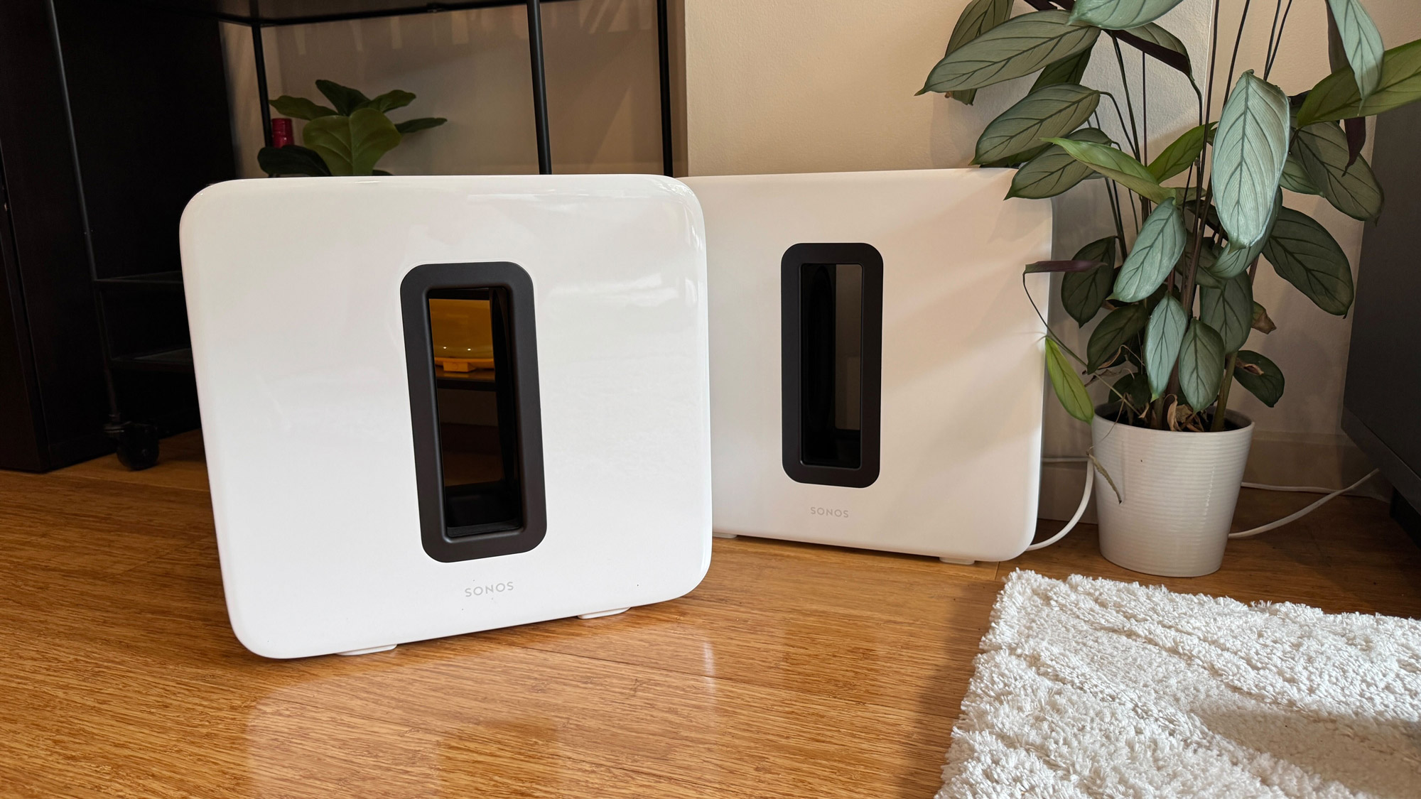 Sonos Sub 3 and Sonos Sub 4, both in white, side by side