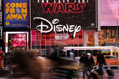 The Disney logo is displayed outside the Disney Store in Times Square, December 14, 2017 in New York City. 