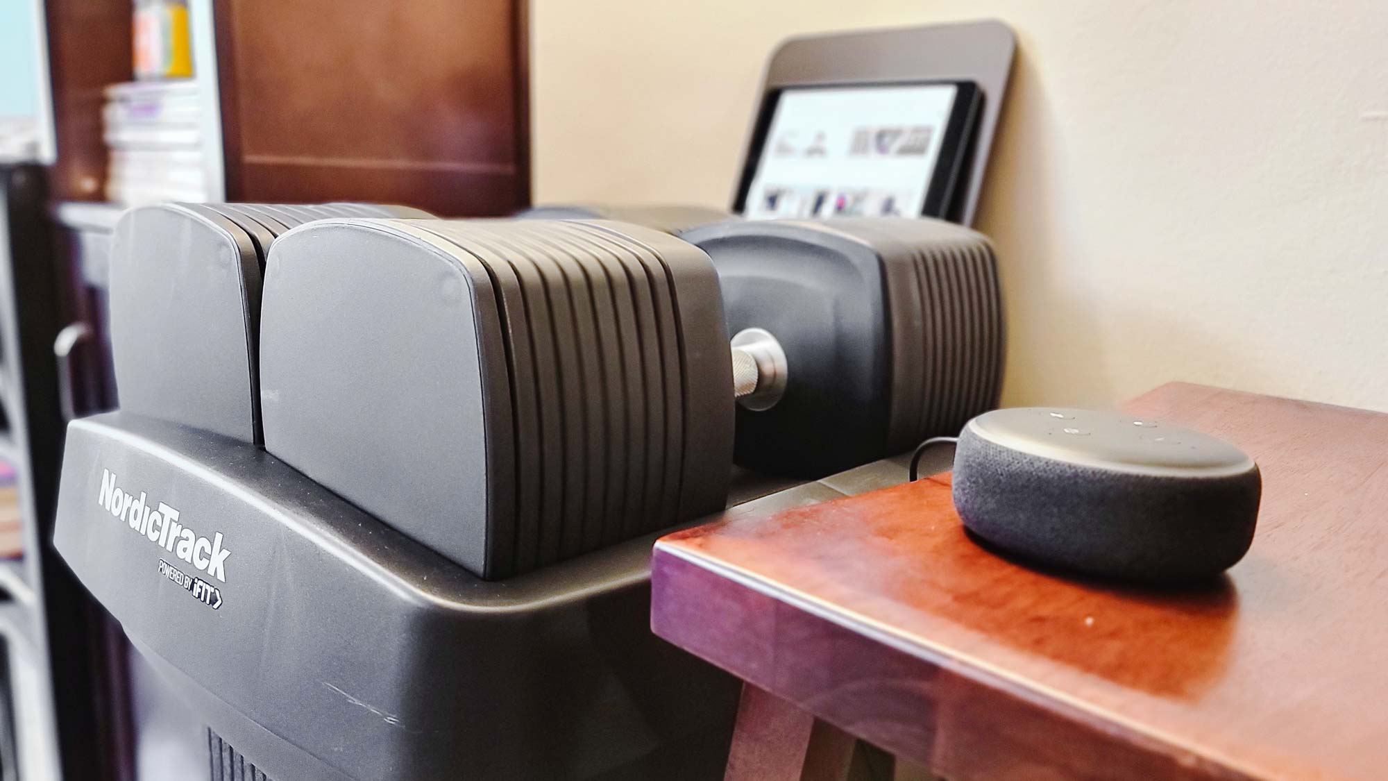 NordicTrack iSelect Voice-Controlled Dumbbells in stand