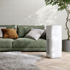 White large capacity air purifier displayed in room 