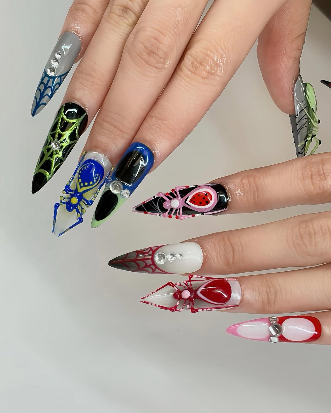 spidery stiletto halloween manicure