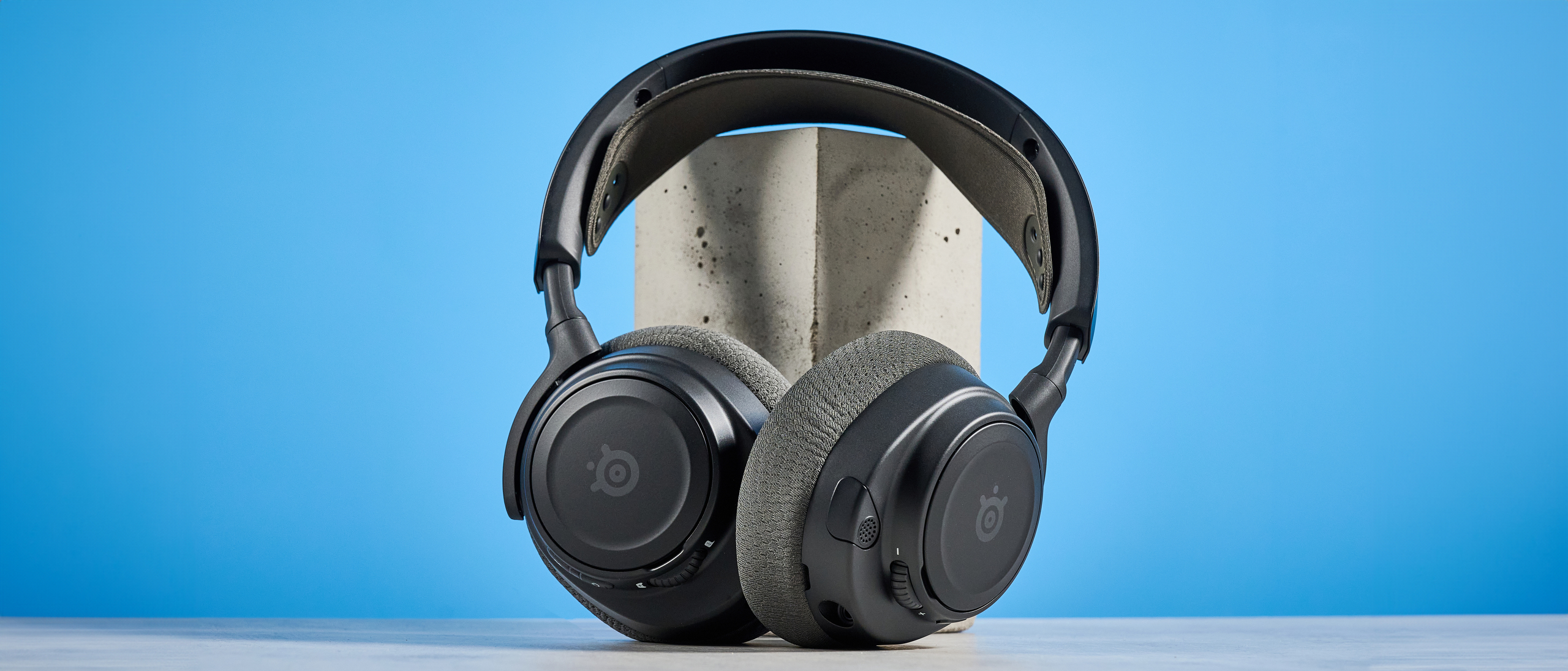 The SteelSeries Arctis Nova 7 Gen 2 against a blue background