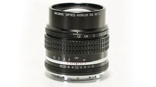 Mr Ding Noxlux DG 50mm f/1.2 on a white background