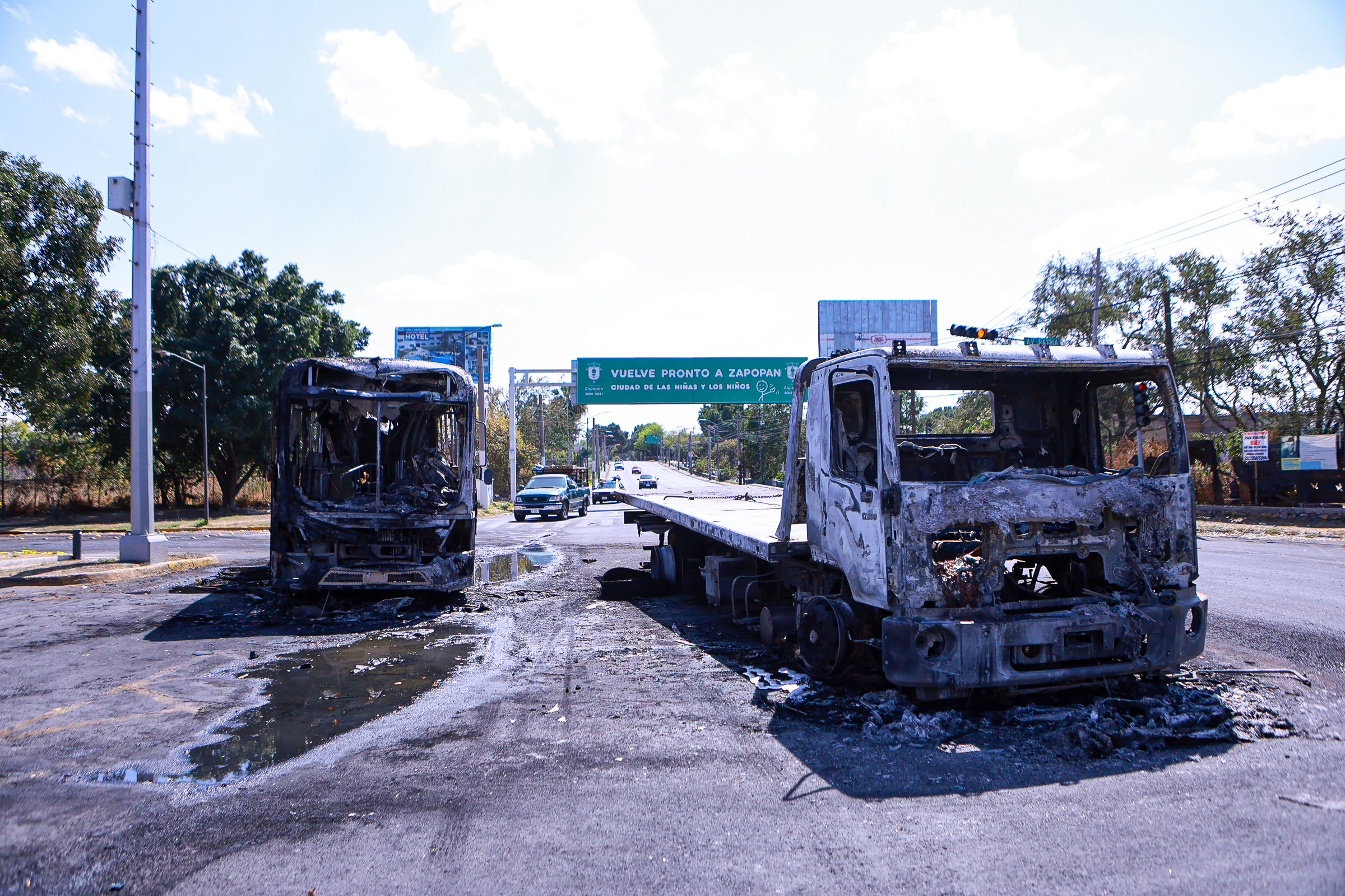 ZAPOPAN, MEXICO - FEBRUARY 22: Burned vehicles at on February 22, 2026 in Guadalajara, Mexico. Road blockades and vehicle burnings have been reported in several parts of Mexico since early morning. The Secretariat of National Defense of Mexico has confirmed that during a security operation in Tapalpa, Jalisco, Nemesio Oseguera Cervantes, known as 'El Mencho' leader of the Jalisco New Generation Cartel was killed, along with four other members. Three Mexican soldiers were wounded during the operation. (Photo by Getty Images/Getty Images)