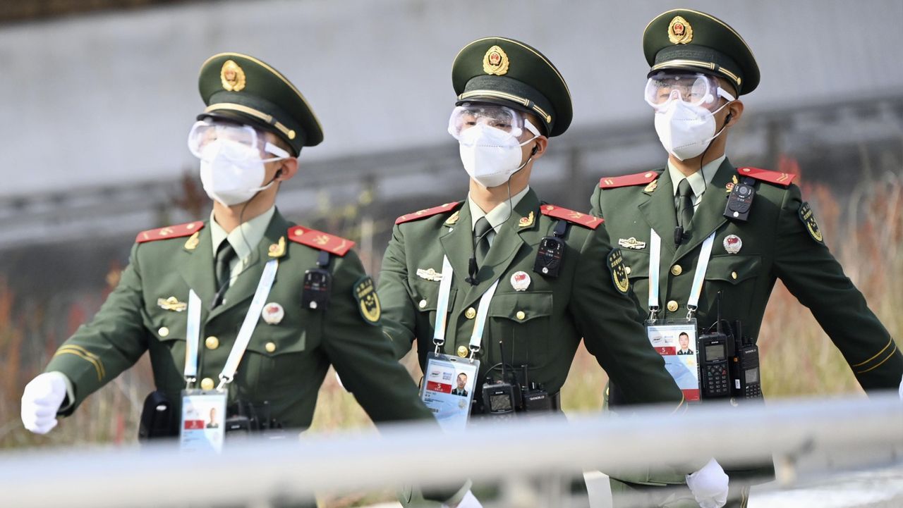 Armed police on patrol in Beijing in 2021