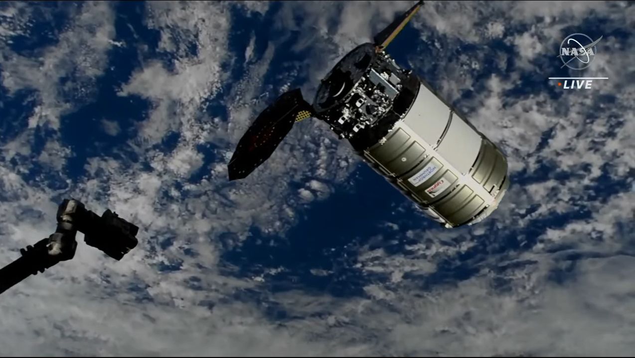 The Northrop Grumman Cygnus NG-18 cargo ship approaches the International Space Station with only one solar panel deployed (the failed one is at right) on Nov. 9, 2022.