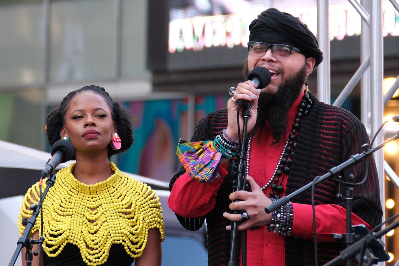 A man singing on stage