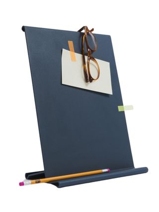 A standing bookstand in blue painted chrome.