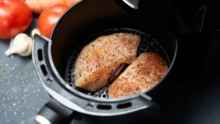 Turkey breasts cooking in an air fryer