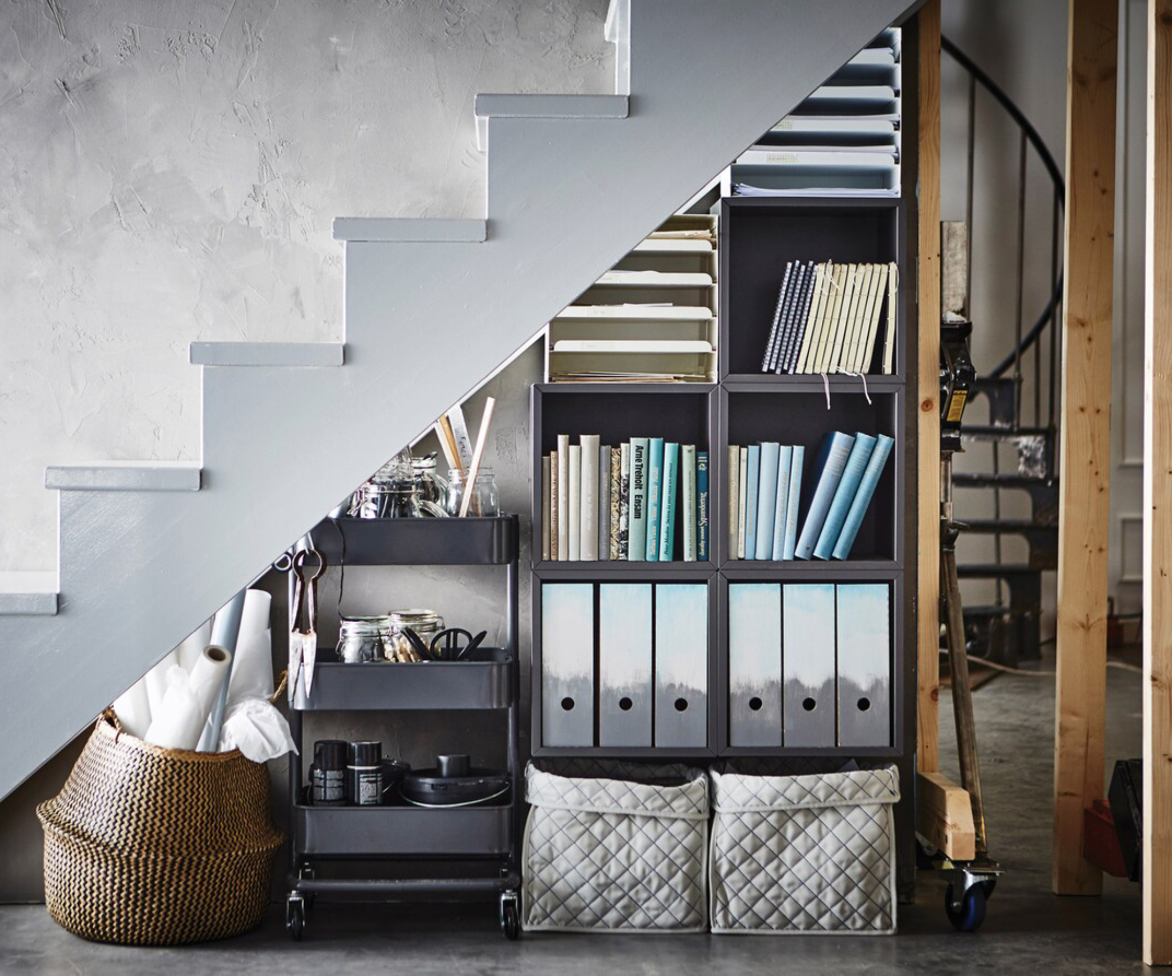 freestanding grey understairs storage with files and artists materials