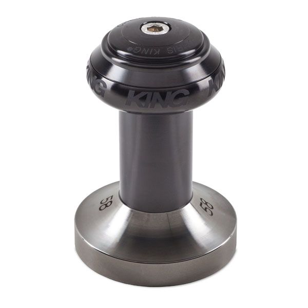 The Chris King espresso tamper is designed around the brand's NoThreadSet headset