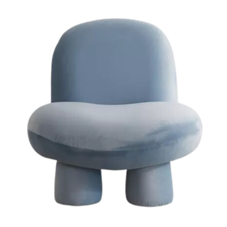 A plush armless blue sofa chair