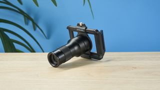 An Apexel TM6 TeleMacro lens for smartphones