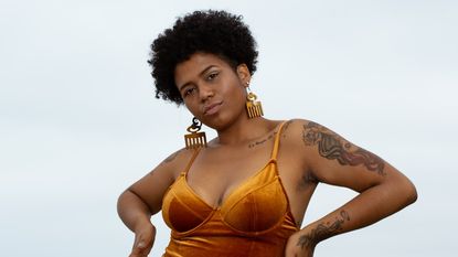 woman wearing orange bathing suit