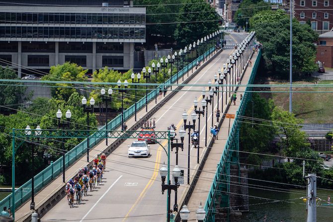 What's left of the men's peloton crosses a bridge leaving downtown during the US Pro Road Race National Championships on June 24, 2018 in Knoxville, Tennessee