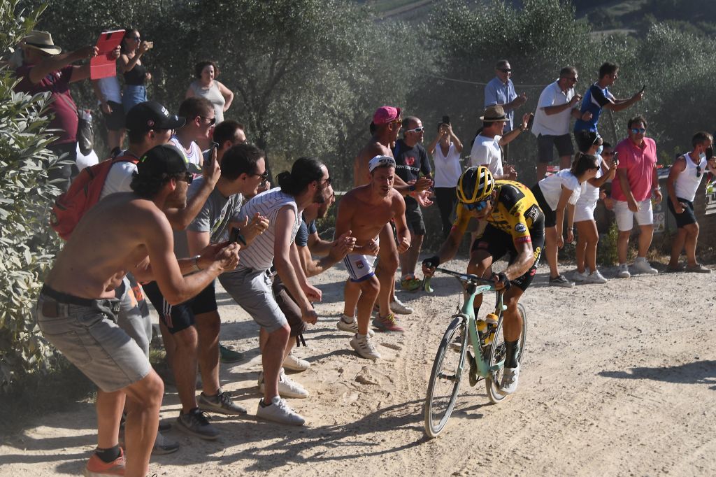 Team JumboVisma Belgian rider Wout van Aert pedal during a break away through a dusty gravel road in the oneday classic cycling race Strade Bianche White Roads on August 1 2020 around Siena Tuscany Photo by Marco Bertorello AFP Photo by MARCO BERTORELLOAFP via Getty Images