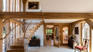 hallway in oak frame house with double height landing