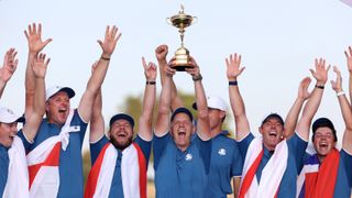 Team Europe Captain Luke Donald lifts the trophy after Europe won 16.5pts to 11.5pts during the Sunday singles matches of the 2023 Ryder Cup