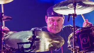 SEATTLE, WA - JULY 19: Neil Peart of Rush performs on stage during the R40 LIVE Tour at KeyArena on July 19, 2015 in Seattle, Washington. (Photo by Mat Hayward/Getty Images)