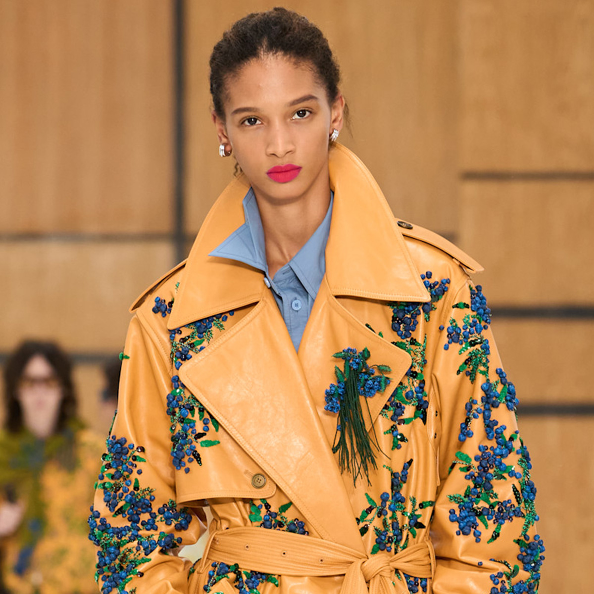 A woman at the burberry spring 2027 show.
