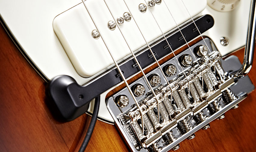 The TriplePlay divided pickup is easily affixed to any guitar with no modifications needed