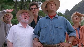 The cast of Jurassic Park looks up curiously.