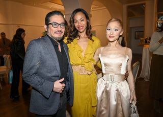 Hiroyuki Sanada, Zoe Saldana, Ariana Grande at the Golden Globes First-Time Nominee Luncheon at Maybourne Beverly Hills on December 17, 2024 in Los Angeles, California.