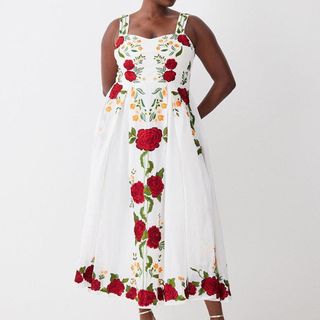 model wearing Karen Millen Plus Rose Dress