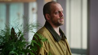 Daniel looking sinister at the school reunion