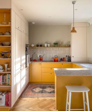 Pluck kitchen with yellow high pressure laminate cabinets in Market Mustard