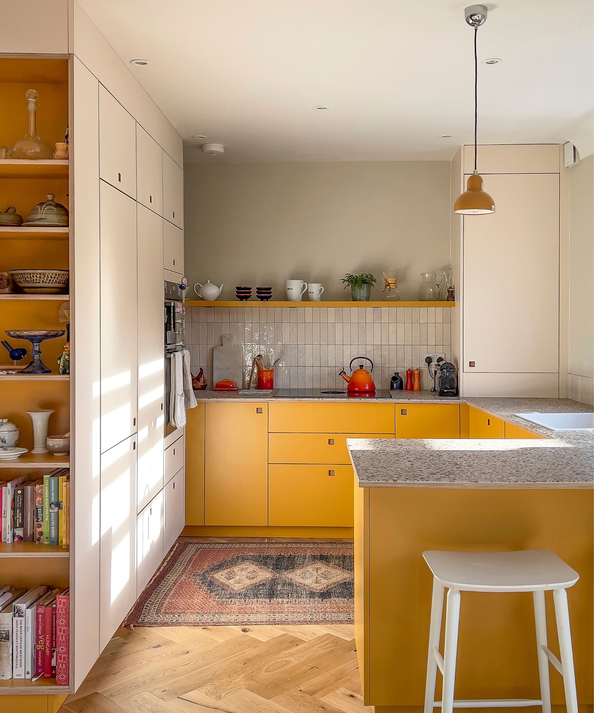 Pluck kitchen with yellow high pressure laminate cabinets in Market Mustard