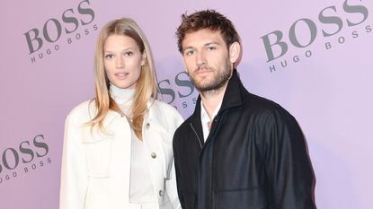 Alex Pettyfer and Toni Garrn attend the Boss fashion show on February 23, 2020