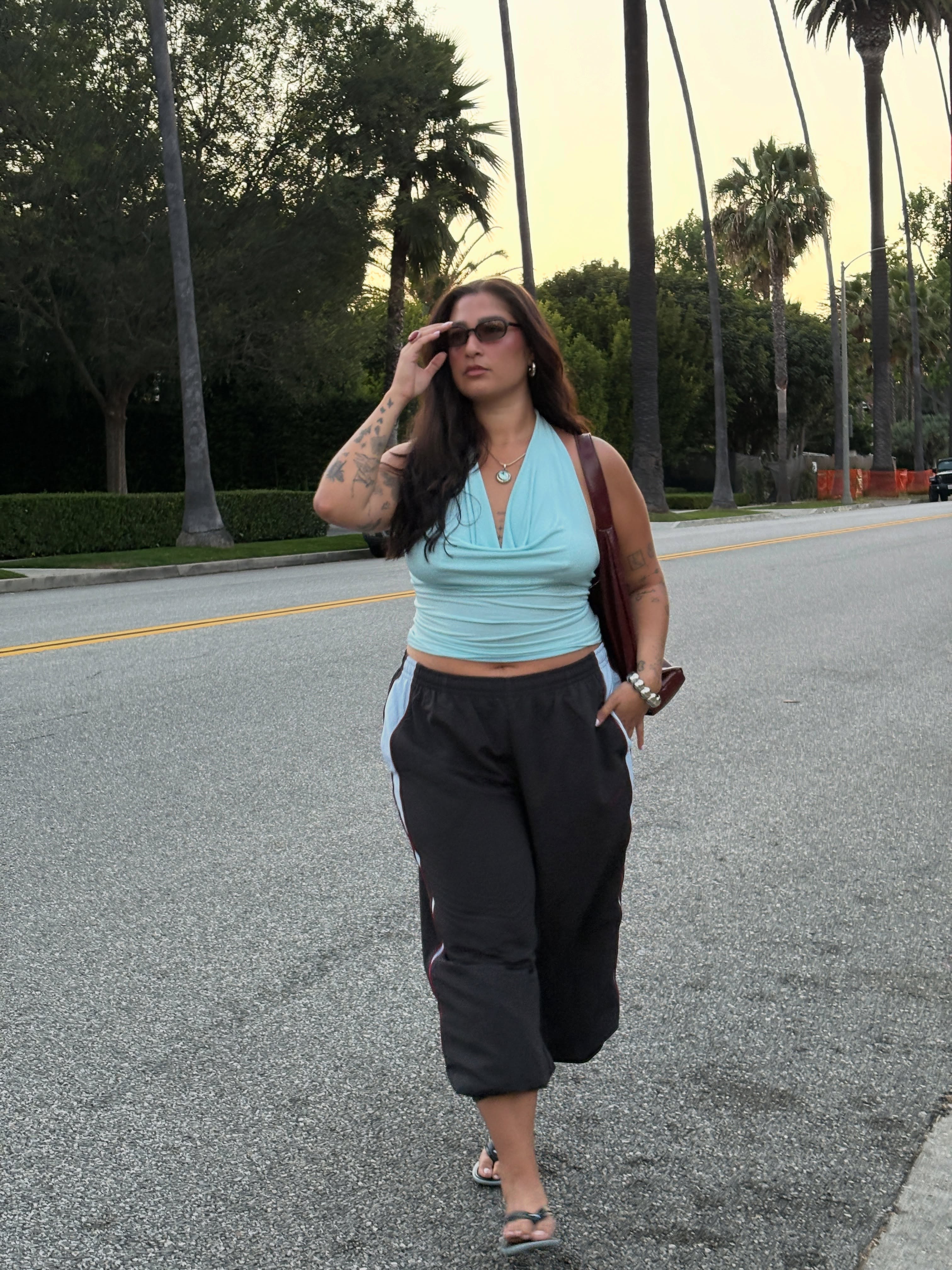 An image of a woman wearing best shoes to wear with capri sweats