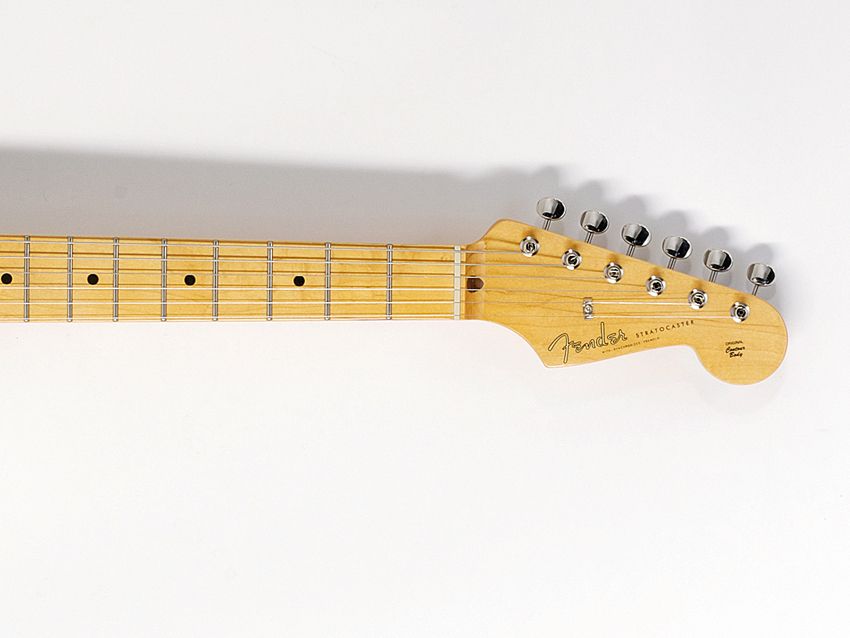 The maple neck offers a 'V' shape