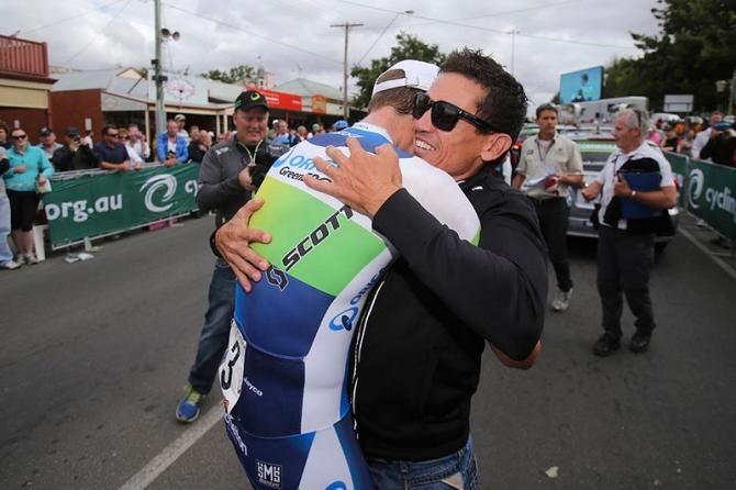 Durbridge receives a celebratory hug from Robbie McEwen