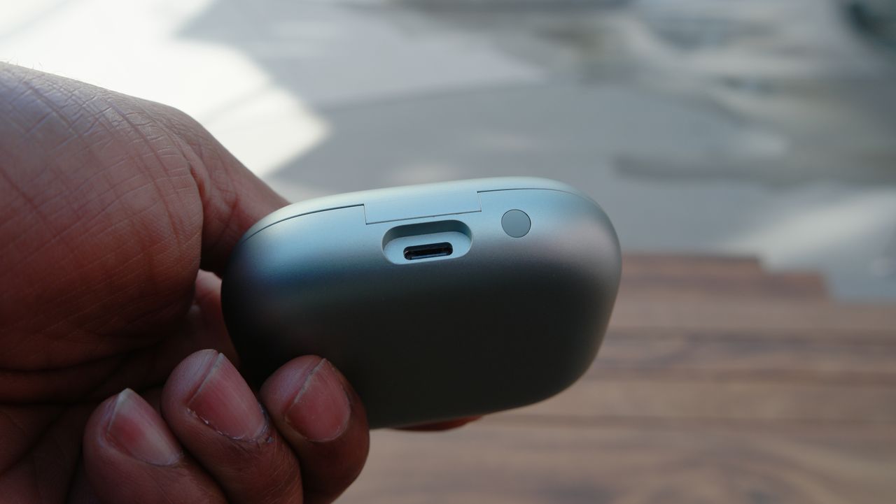 Anker Soundcore AeroFit 2 showing the charging options on the rear of the case