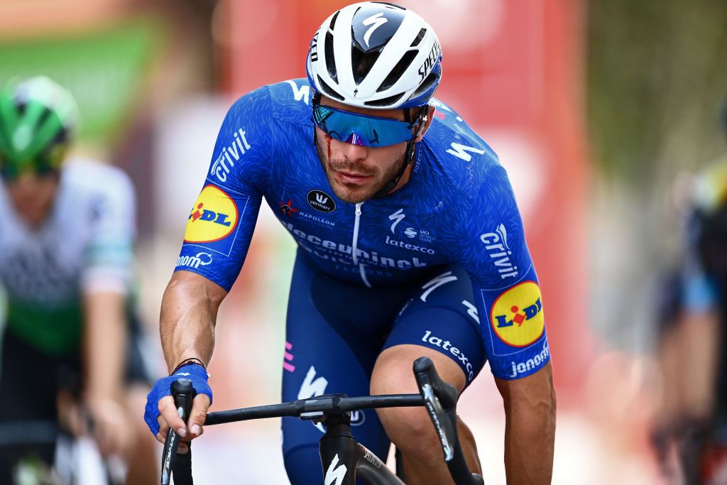 ALBACETE SPAIN AUGUST 18 Florian Senechal of France and Team Deceuninck QuickStep crosses the finishing line injured after crash during the 76th Tour of Spain 2021 Stage 5 a 1844km stage from Tarancn to Albacete lavuelta LaVuelta21 on August 18 2021 in Albacete Spain Photo by Stuart FranklinGetty Images