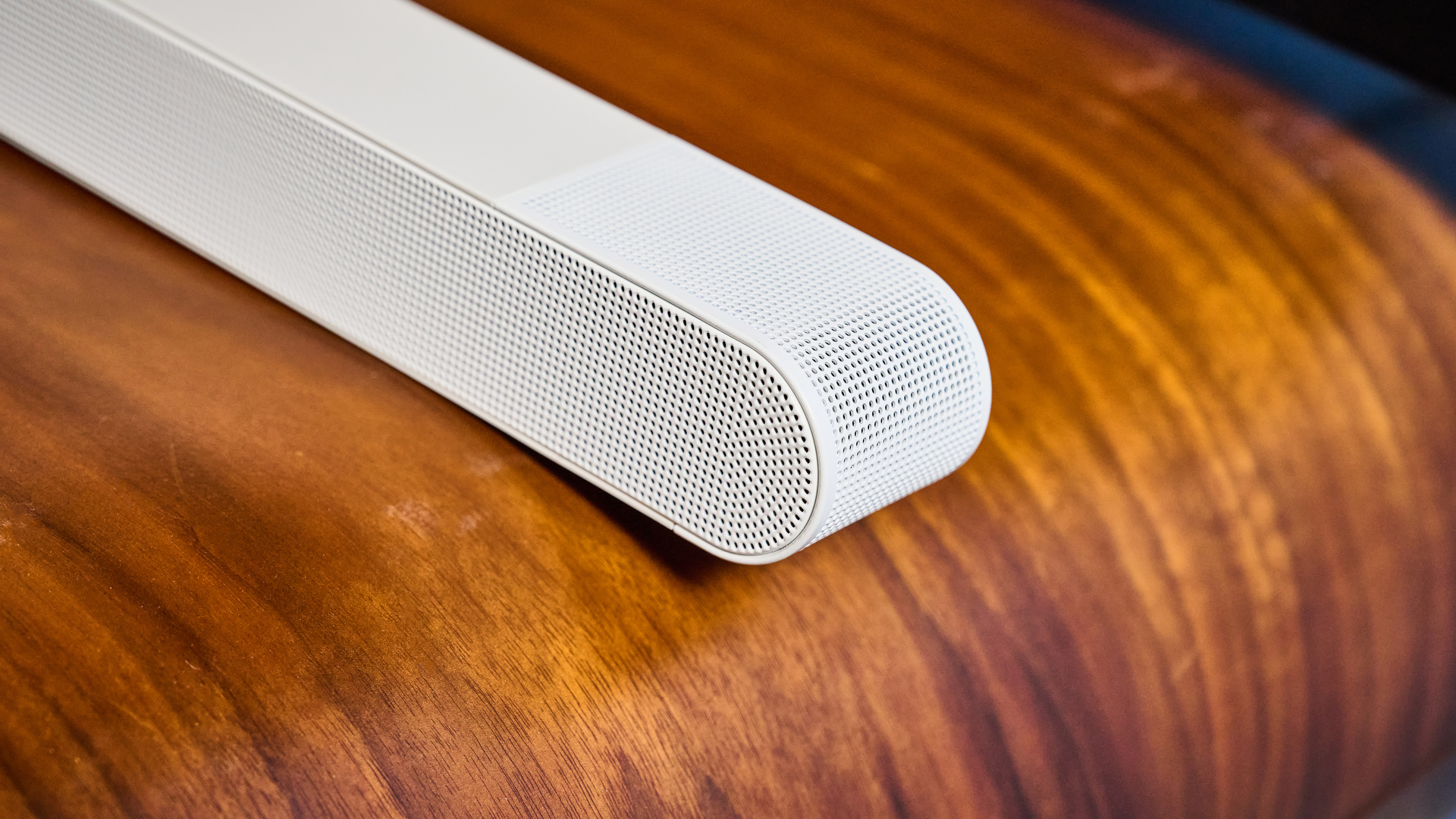 the samsung hw-s801d soundbar and subwoofer in white, an ultra slim soundbar with on-bar buttons, a remote, and separate subwoofer with a black cone