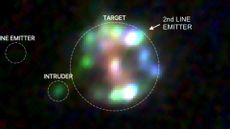 A pixelated image of a glowing circle of colors.