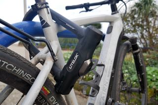 Litelok X3 locking a Fazua e-bike to a bike rack