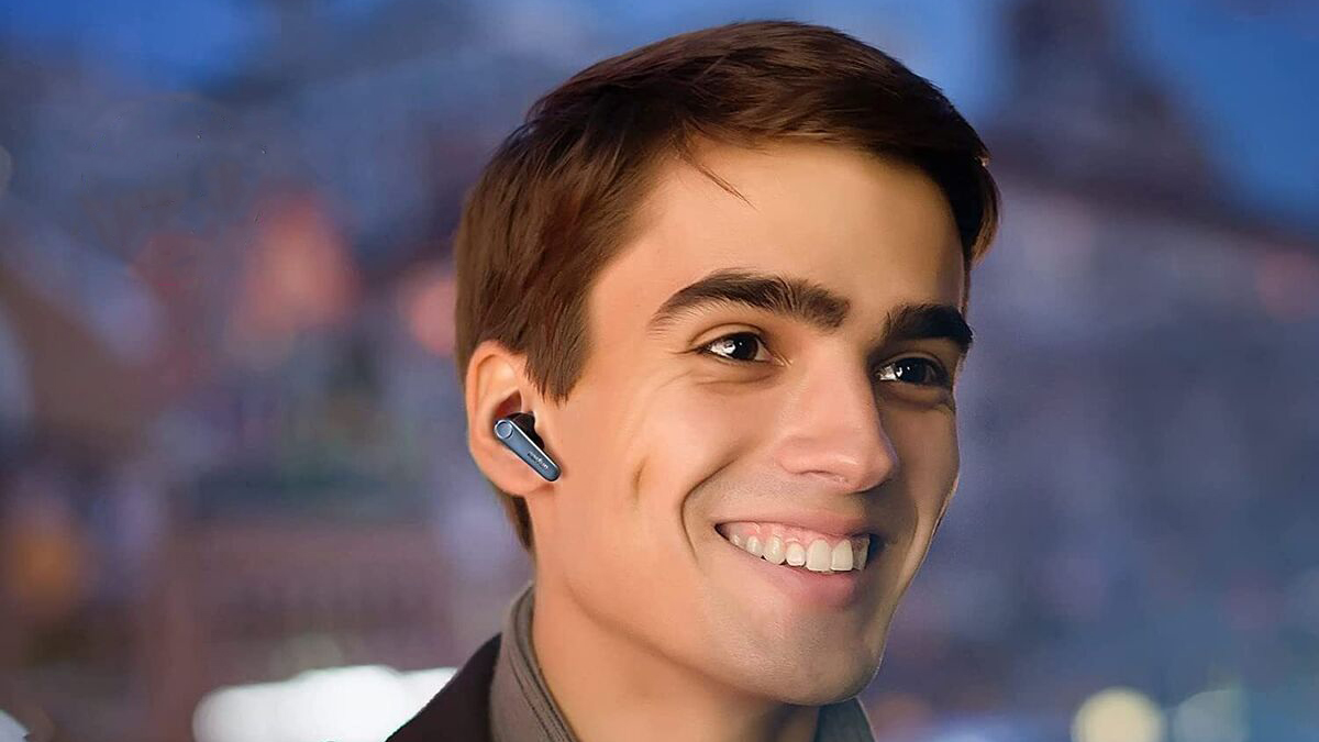 Man wearing the Earfun Air Pro 3 earbuds.