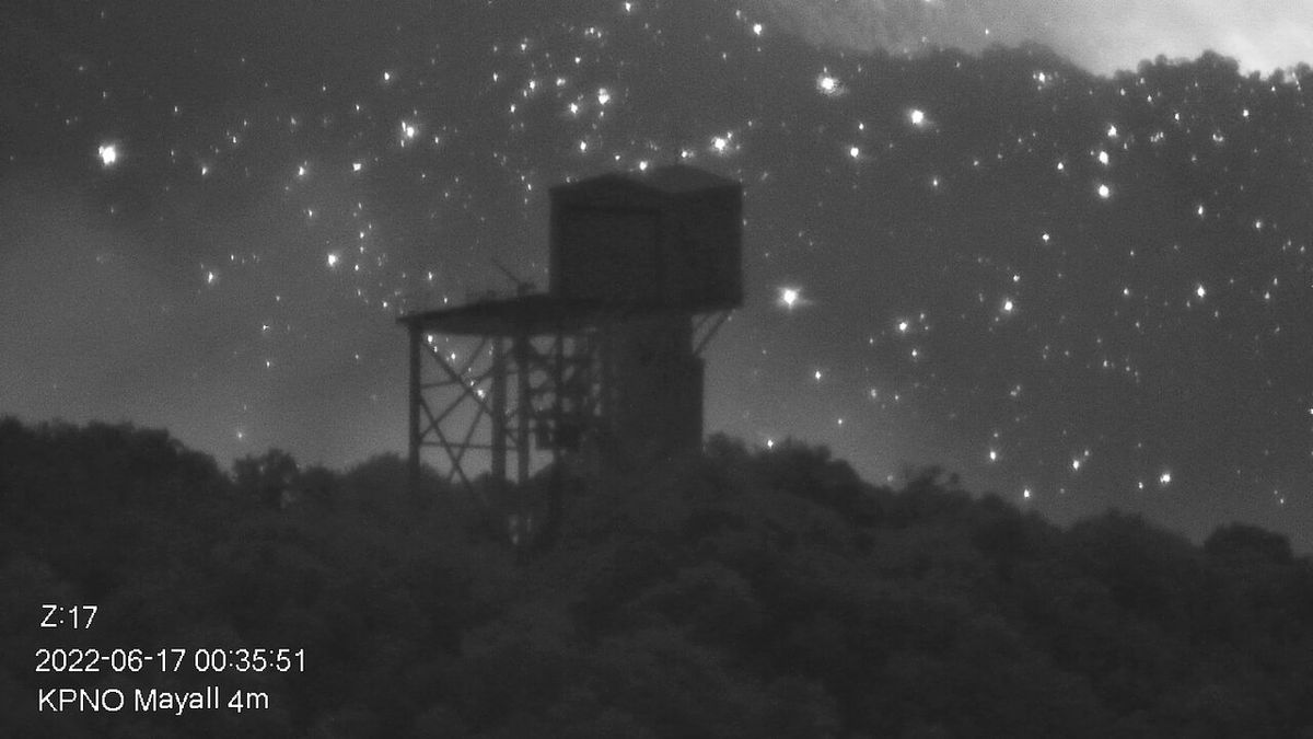 Kitt Peak National Observatory's Calypso Telescope seen in front of the Contreras Fire early on June 17, 2022.