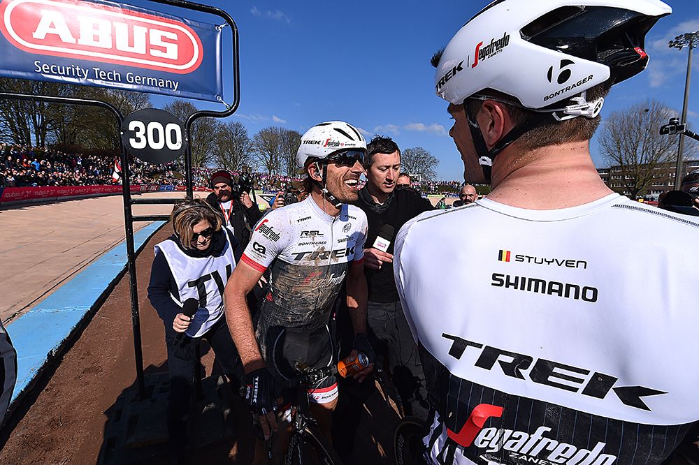 Jasper Stuyven waits for Fabain Cancellara after the duo finished together