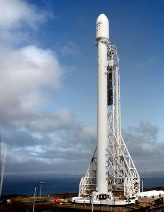 An upgraded SpaceX Falcon 9 rocket stands poised to launch from Space Launch Complex 4 at Vandenberg Air Force Base in California in September 2013. Liftoff set for Sept. 29, 2013.
