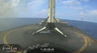 A SpaceX Falcon 9 rocket first stage on the drone ship Just Read The Instructions after a successful landing in the Atlantic Ocean following the launch of the U.S. Space Force's GPS III SV3 navigation satellite from Cape Canaveral Air Force Station, Florida on June 30, 2020.