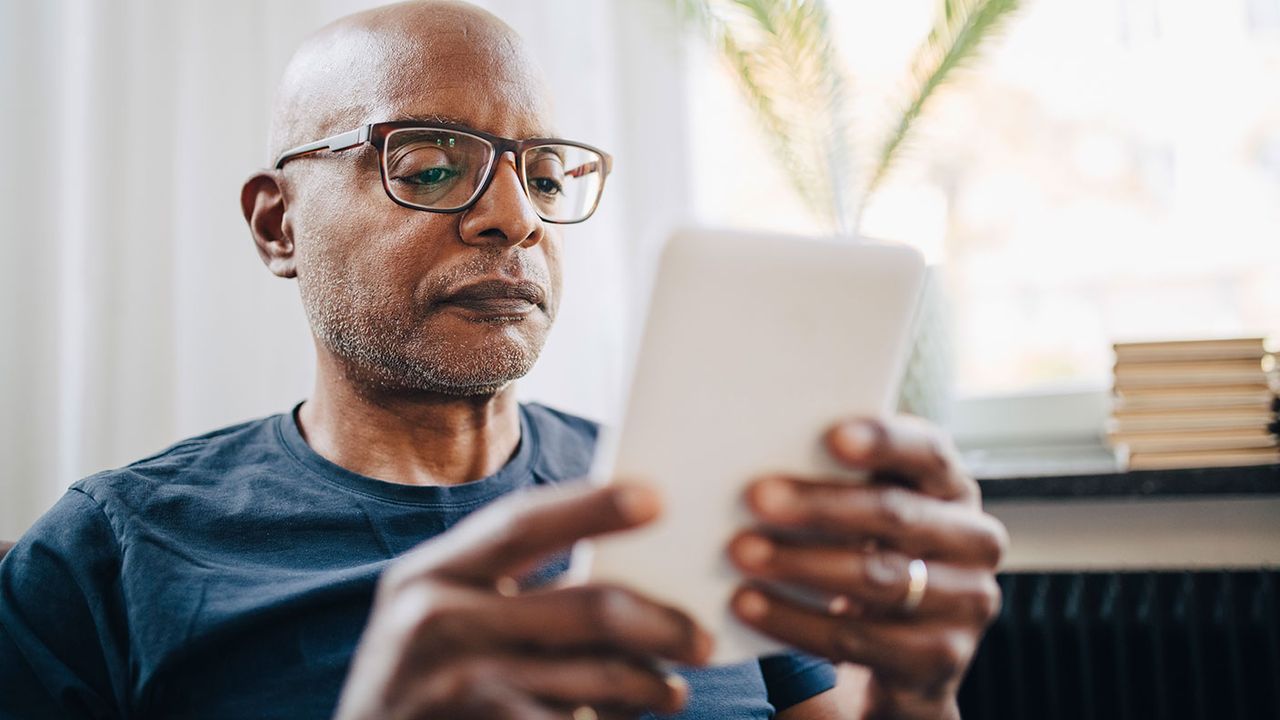 Man reading an e-book