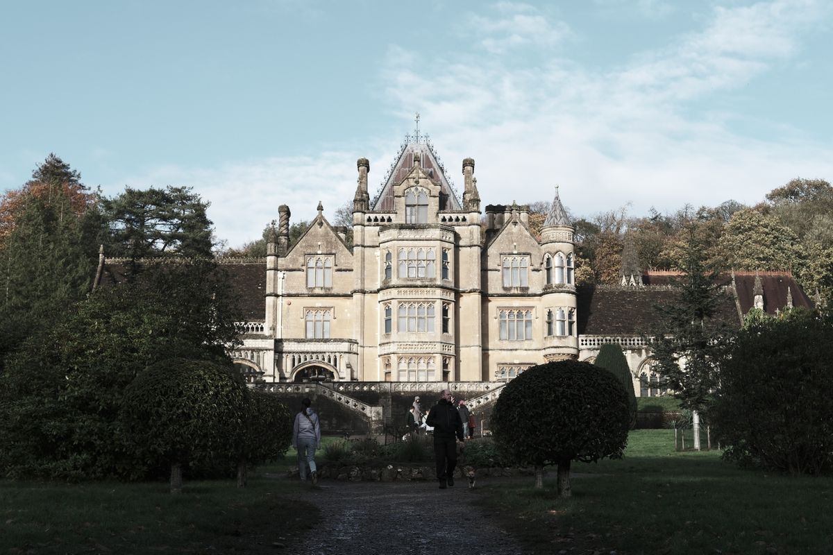 A photo of a grand stately home in the sunlight.