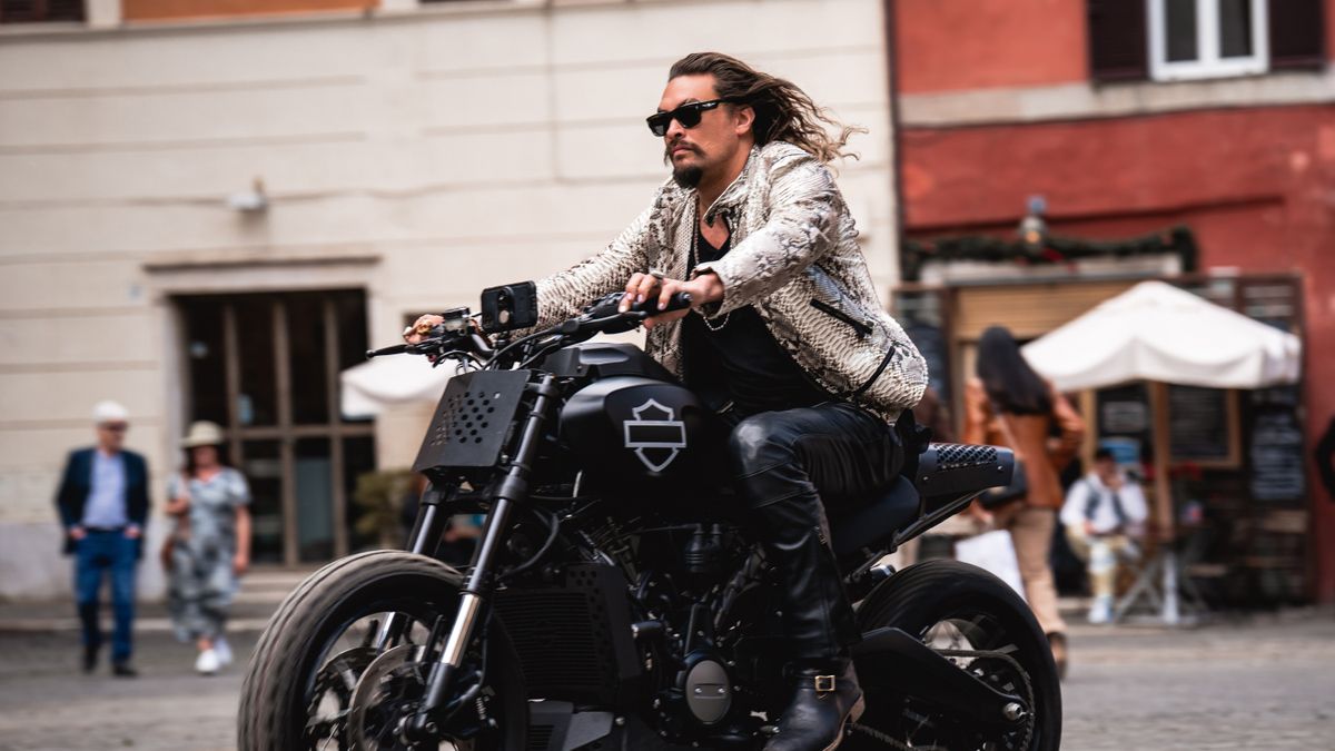 Jason Momoa riding a motorcycle in Fast X