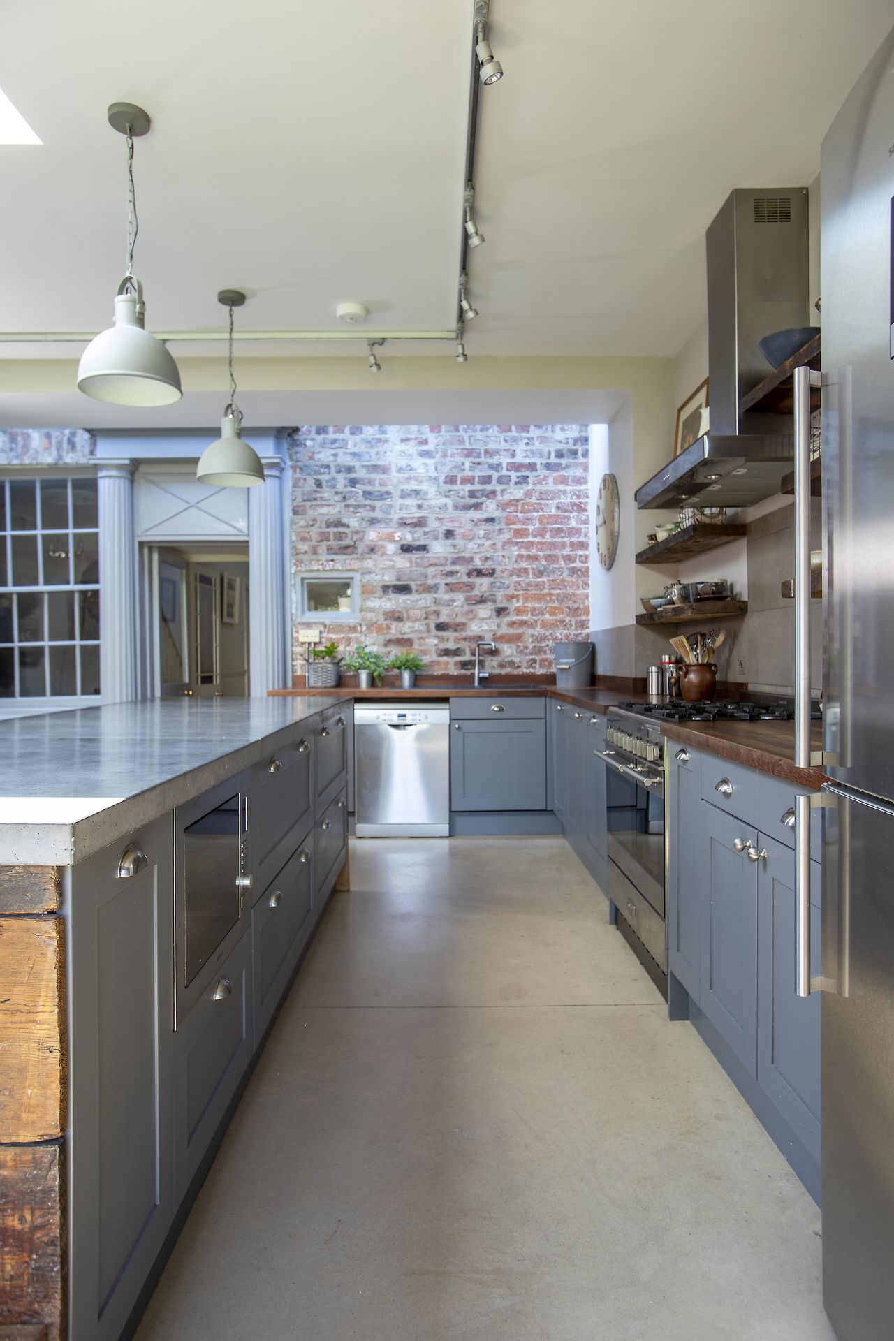 dark grey kitchen with range cooker and island