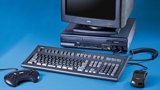 A retro SEGA gaming PC with gamepad, keyboard and mouse